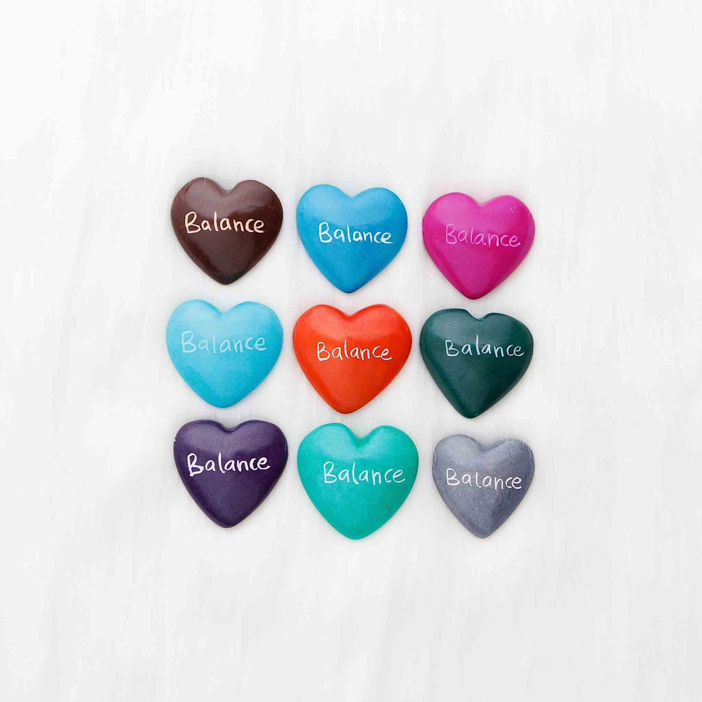 Hand-carved soapstone heart with engraving, ethically made in Kenya.