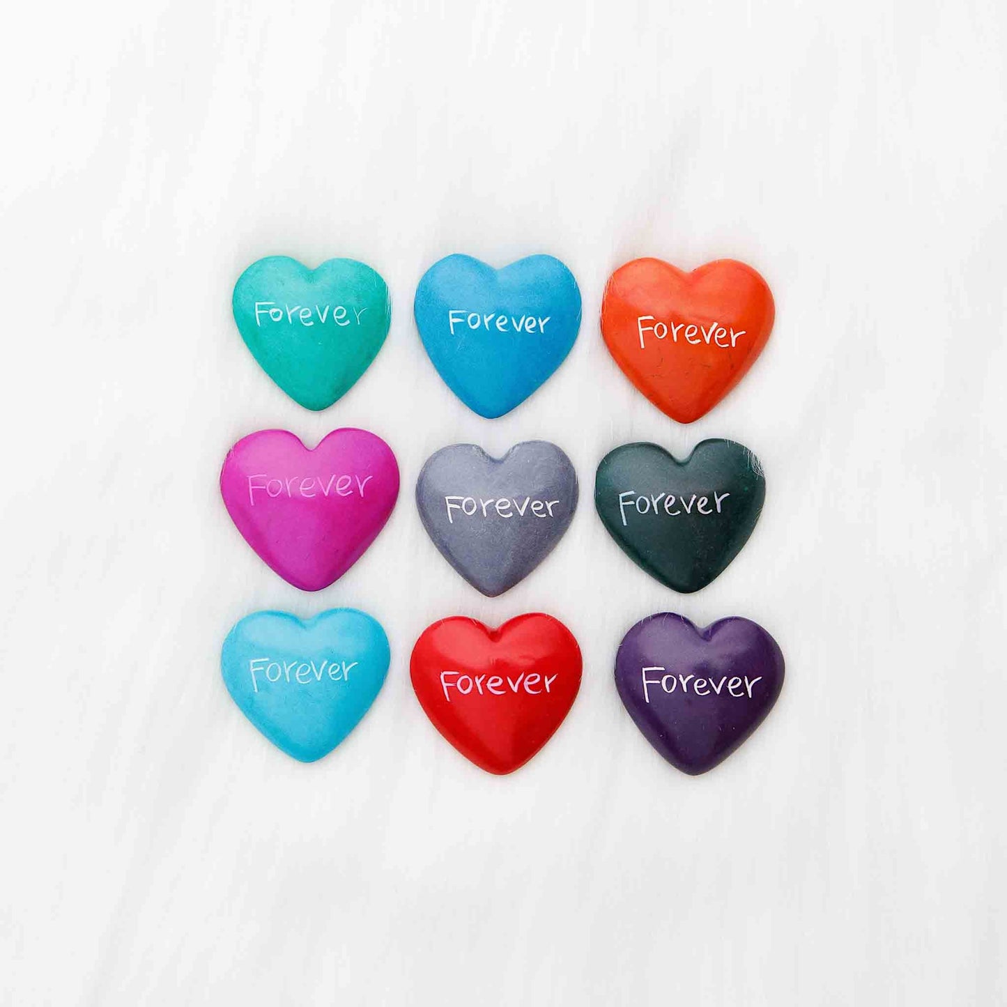 Hand-carved soapstone heart with engraving, ethically made in Kenya.