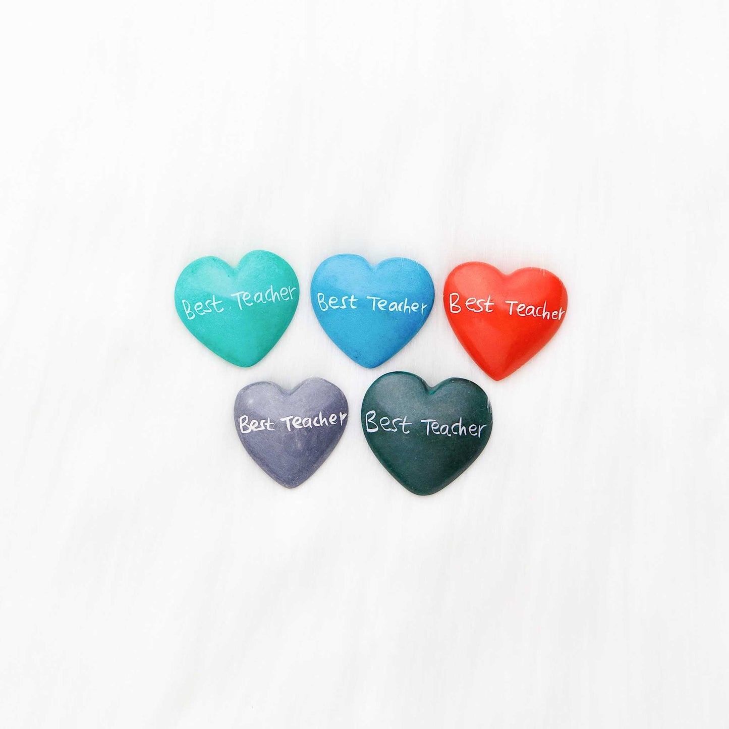 Hand-carved soapstone heart with engraving, ethically made in Kenya.