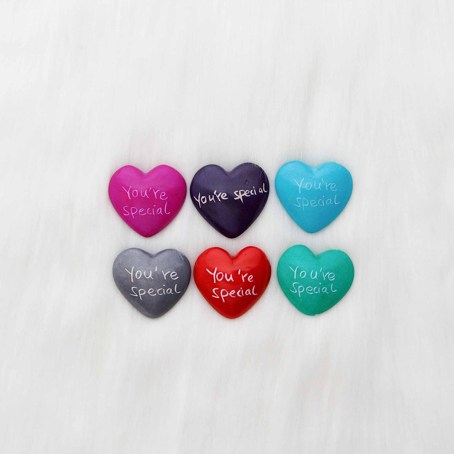 Hand-carved soapstone heart with engraving, ethically made in Kenya.