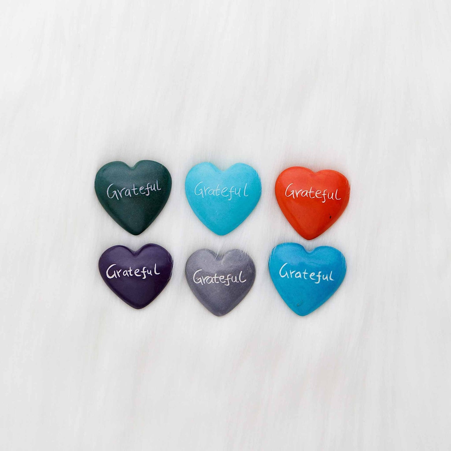 Hand-carved soapstone heart with engraving, ethically made in Kenya.