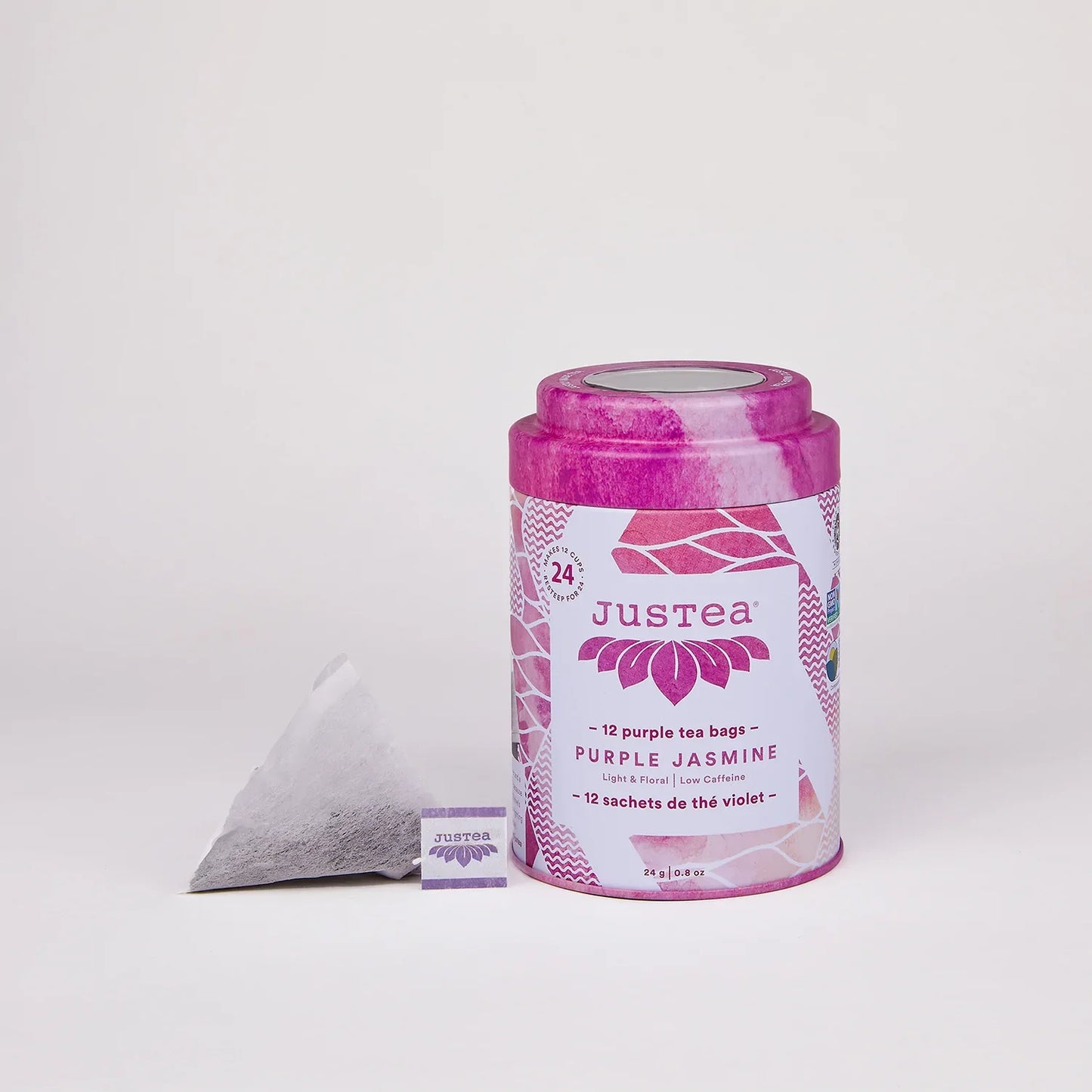 Organic Purple Jasmine tea with jasmine blossoms and vibrant purple tea leaves