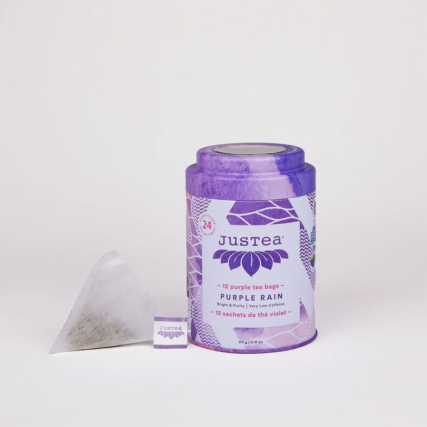 Organic Purple Rain tea with tropical fruit and vibrant purple tea leaves